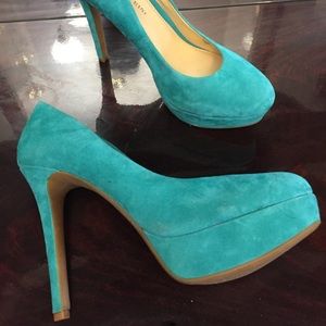 Green suede pumps